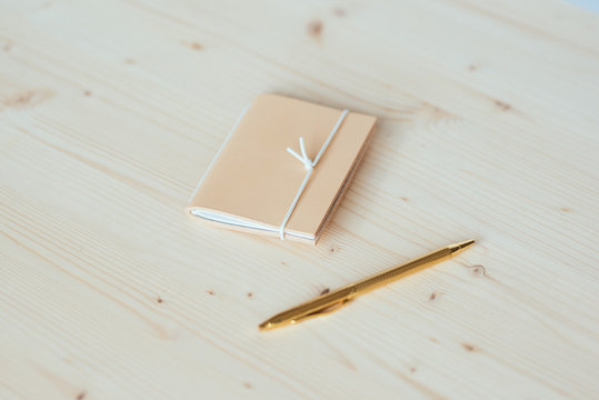 Leather notebook and pen