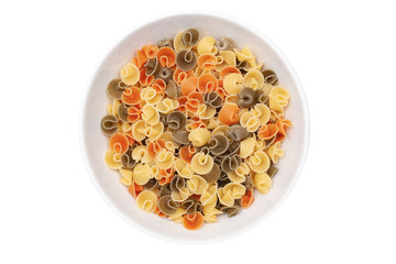 Pasta mushrooms in a white bowl. Isolated. Top view.