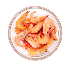 Frozen shrimp in a transparent bowl. Isolated