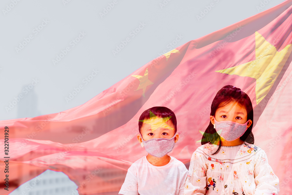 Wall mural Covid-19 and Air pollution pm2.5 concept.Little chinese schooler kids wearing mask for protect pm2.5.Children sibling protection for stop corona virus.Wuhan coronavirus and epidemic virus symptoms.