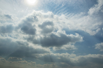 Fototapeta na wymiar Beautiful white fluffy clouds against blue sky, natural background
