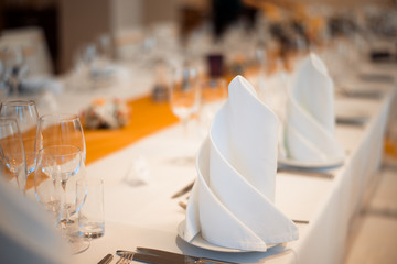 Table setting in restaurant.