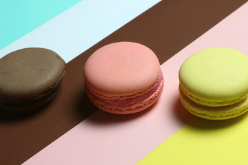 colored almond cakes on a multicolored background