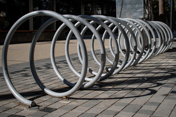 Empty parking spaces grey color for bicycles outdoors