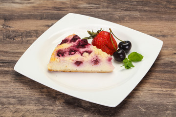 Cheesecake with cherry served strawberry