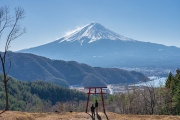 View of Torii gate of Asama Shrine with Mount Fuji in background