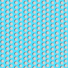 White pills on blue background pattern