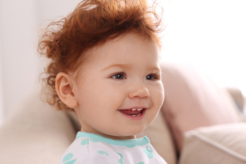 Fototapeta premium Portrait of cute little child at home