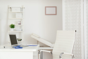 Doctor's workplace with modern laptop in medical office