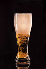 Glass beer on wood background with copy space