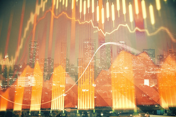 Financial graph on night city scape with tall buildings background multi exposure. Analysis concept.