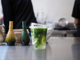 iced matcha green tea with lemon and fresh mint .Copy space