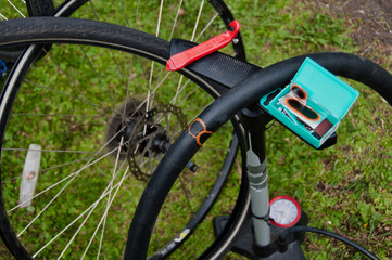 Close up picture of fixing bike tire. Illustrating bike fixing at home.