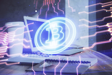 Double exposure of blockchain theme hologram and table with computer background. Concept of bitcoin...
