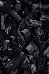 spilled charcoal on a surface