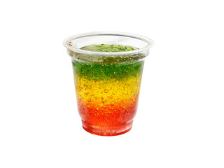 Fototapeta na wymiar Multicolored jelly in plastic Cup isolated on a white background