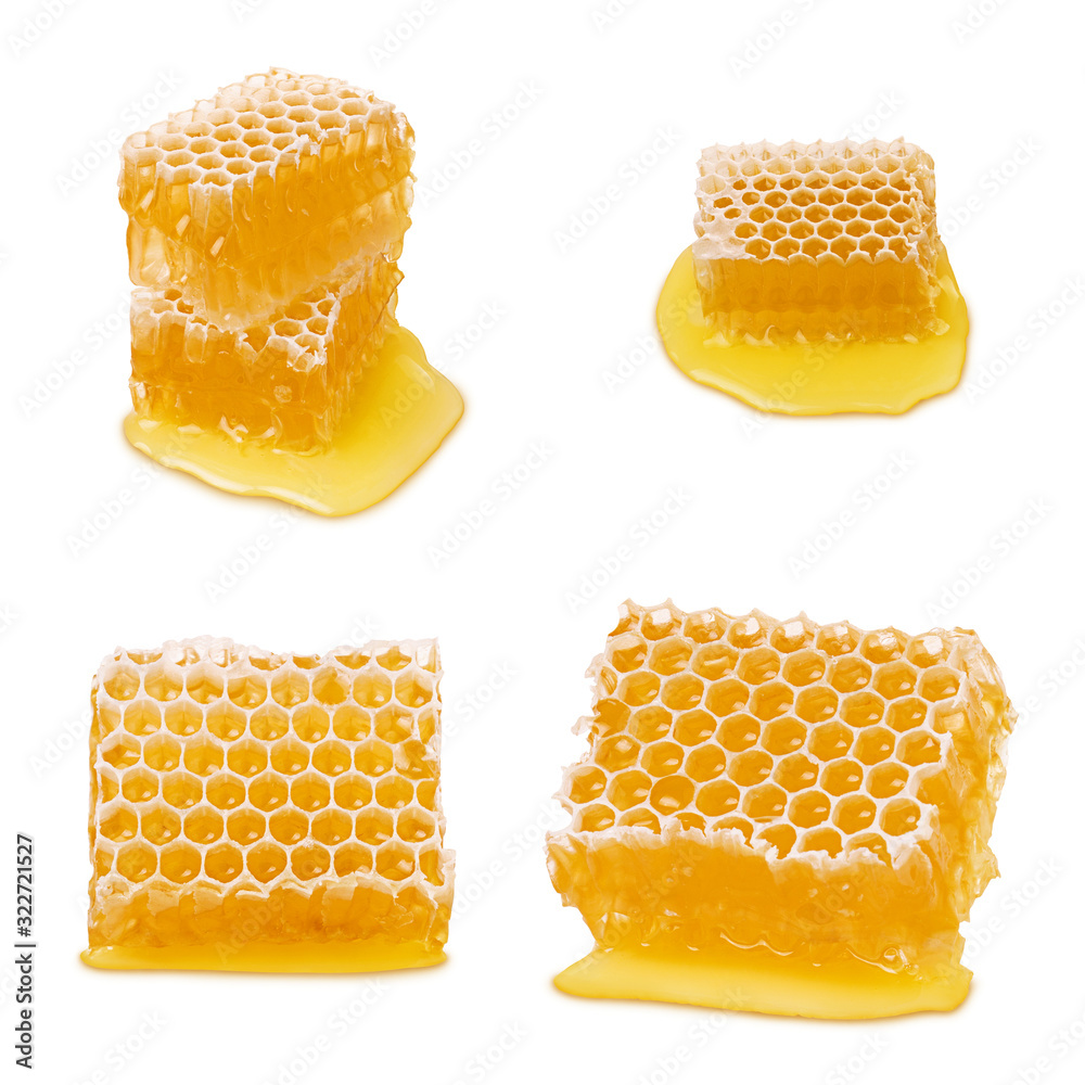 Wall mural Honeycomb isolated. Set of honeycomb parts with liquid bee natural yellow honey isolated on white background