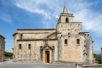 Exterior of the old church in Venasque, a small village in Provence, France