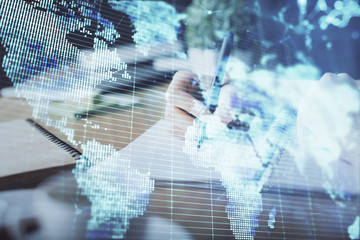 International business hud over woman's hands writing background. Concept of hard work. Double exposure