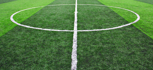 Obraz premium Detailed green soccer field grass texture