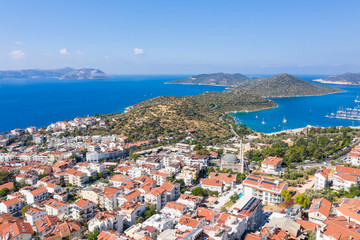 Fototapeta na wymiar An aerial view of the bay of Kas in Antalya Turkey. Sea and town with an open sky.