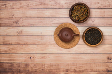 Chinese tea flat lay. Yixing clay teapot and dian hong red tea