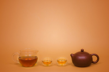 Chinese tea set on orange background