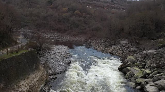 Aerial Over Rocky River Rapids in Spain