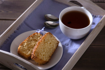 Pie with violet hyacinth on the wooden background