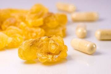 Olibanum, pieces in a mortar with olibanum capsules