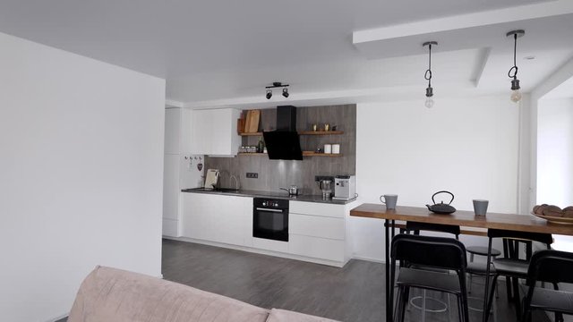 cozy and spacious studio apartment with modern minimalistic interior style with white walls