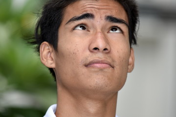 Obraz premium A Filipino Male And Confusion
