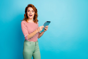 Portrait of excited cute sweet girl use tablet search incredible information impressed scream wow...