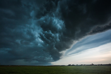 Storm clouds with shelf cloud and intense rain