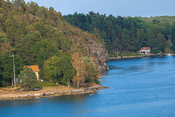 Beautiful view of the sea coast in Sweden. Beautiful places. Stylized photos with added noise