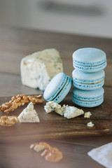 Dor blue and roller coaster of macaroons on background