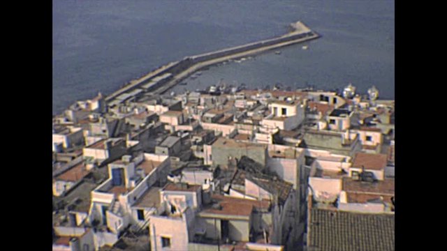 Peniscola cityscape panorama from the top overlook of the walled city with houses and buildings. Historical Peniscola sea town of Spain in the 1970s.