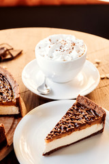 Chocolate cake cafe, nut cake with caramel. Coffee pause.