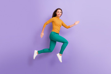Fototapeta na wymiar Full length body size view of her she nice attractive lovely cheerful cheery glad confident strong energetic girl running fast active life soul isolated on violet purple lilac pastel color background