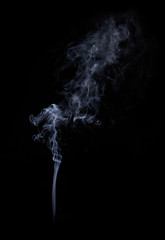 Photo of real white smoke on black background