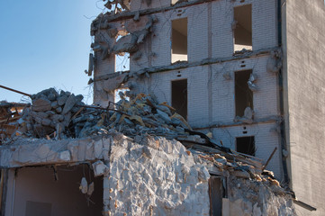 Dismantling a building.