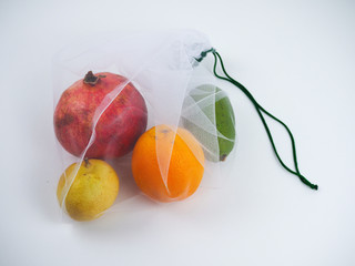 colorful fruits in an eco bag. the concept of zero waste