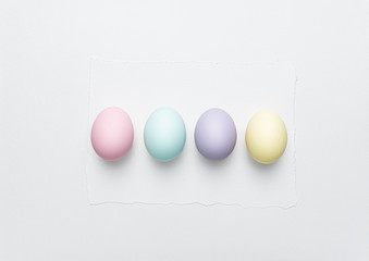Easter background for greeting card and Easter sale announcement. Easter eggs on watercolor paint paper