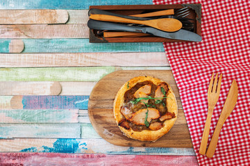 vegetable pie with cherry tomatoes, grilled peppers and courgettes with fresh eggs and fresh cream
