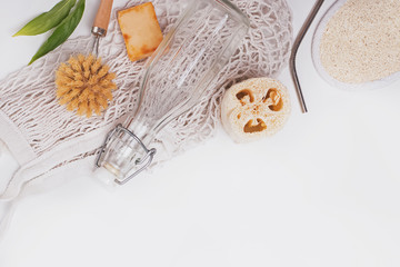 Zero waste plastic free home tools and items on white background.