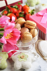 Sweets, strawberries and tulips