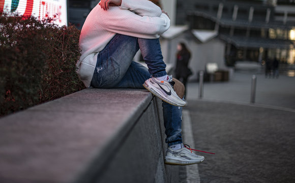 Young man wearing a pair of Nike Air Max 97 Off-White