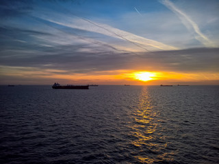 Naklejka premium sunset over the sea