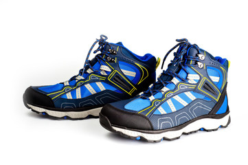 Winter, sports, waterproof men’s boots in blue. On the lacing. Sports winter shoes. Comfort and activity.