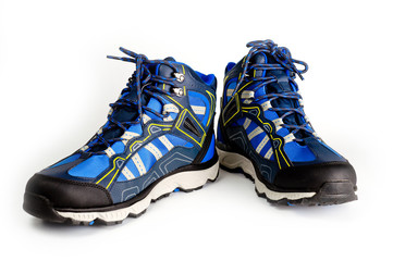 Winter, sports, waterproof men’s boots in blue. On the lacing. Sports winter shoes. Comfort and activity.